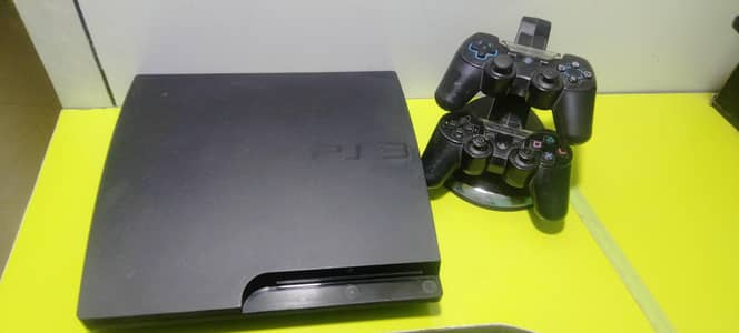 Play Station 3 Slim with 19  game CDs