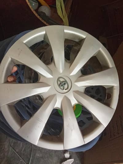 vitz and xli GLI wheel cups three for urgent sale bilqul new han