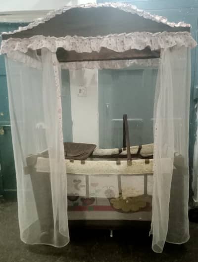 baby cot and playpen
