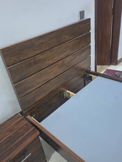 Single bed with side table