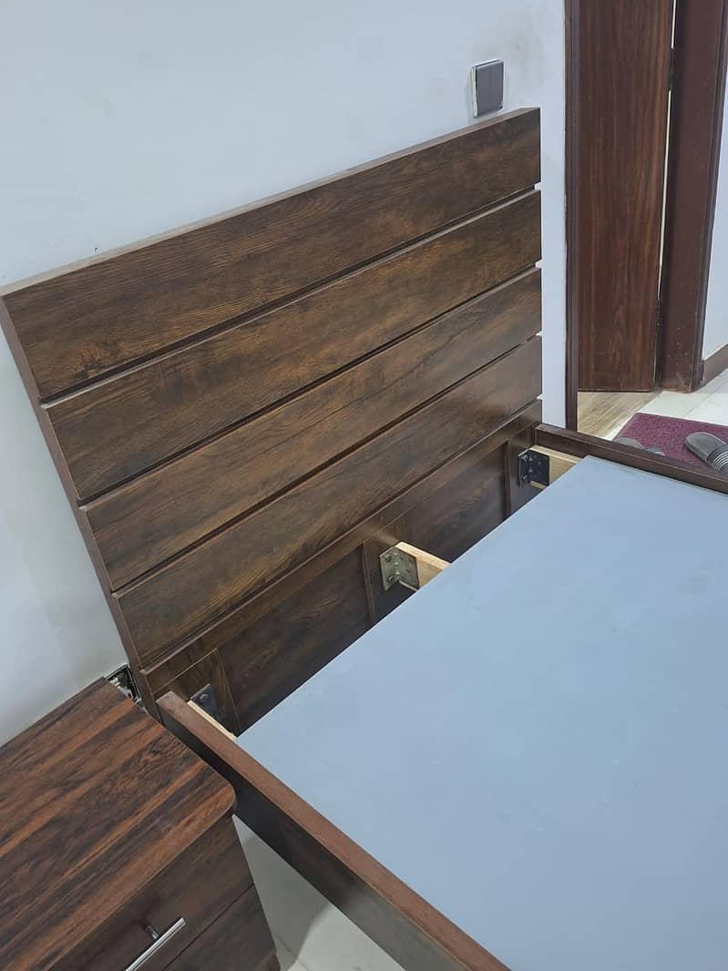 Single bed with side table 0