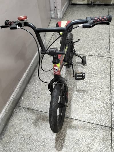 kids cycle with supporting wheels