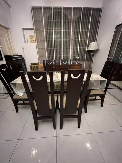 Glass top dining table