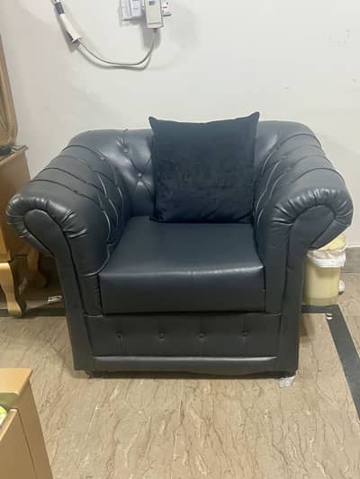 Dark grey leather sofa