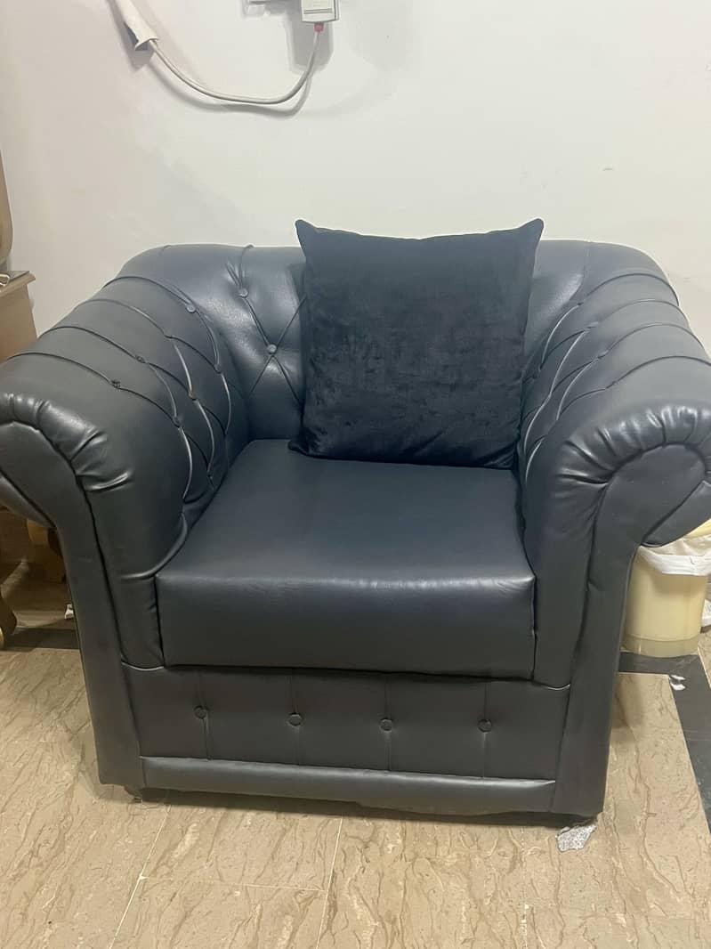 Single grey leather sofa 1