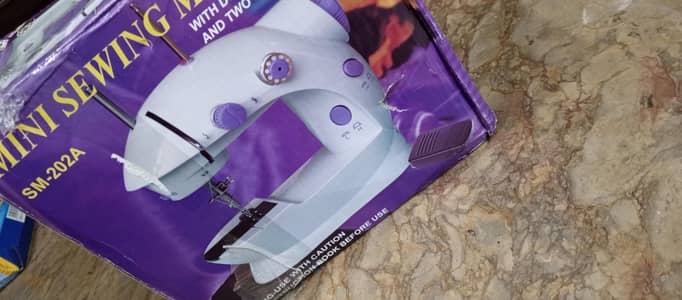 Mini Sewing Machine SM-202A – Portable & Easy to Use