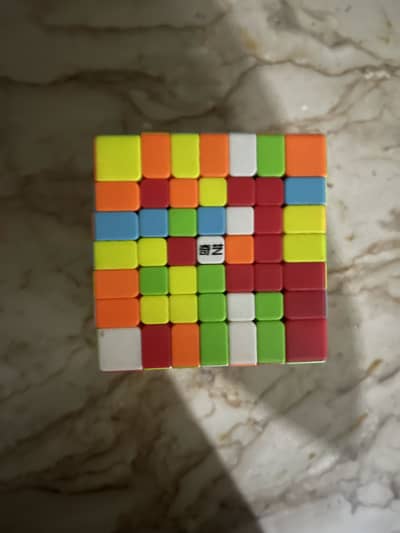 Rubik’s cube 7x7 for sale with a stand of Rubik’s cube
