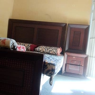 king size bed with two side tables