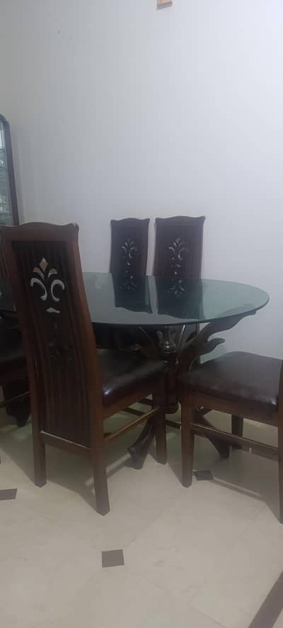 6 chairs and heavy glass table reasonable price.