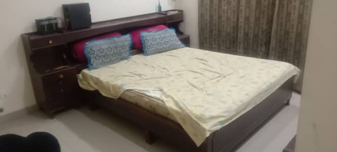 full sise bed in good condition with dressing table and tv trolly. .