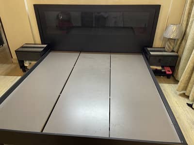 King size bed with two side tables and high quality mattress