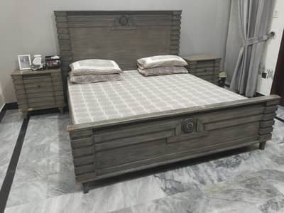 Wooden Queen size Bed with 2 side tables & dressing table.