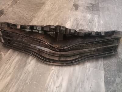 Front bumper and grill (vitz 2011 to 2013 model)