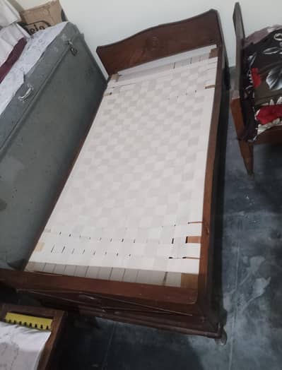 2 wooden single bed