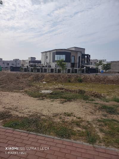 5 Marla 2-Side Open Commercial Plot on 100ft Road | Overseas C | PKR 2.45 Crore