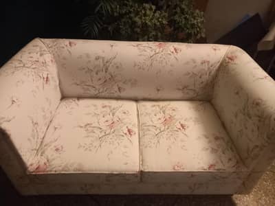 it's 2 seater bed room sofa it's v beautiful