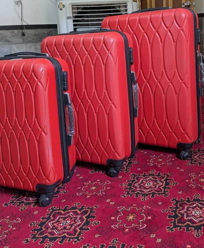 New 3 Red suitcases