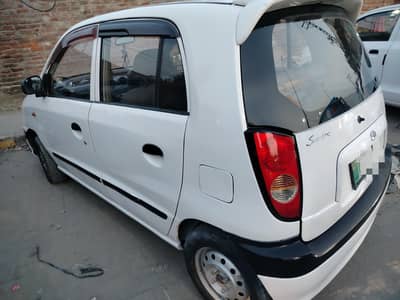 Hyundai santro 2003 BTR than Suzuki mehran Cultus Alto coure wagon r