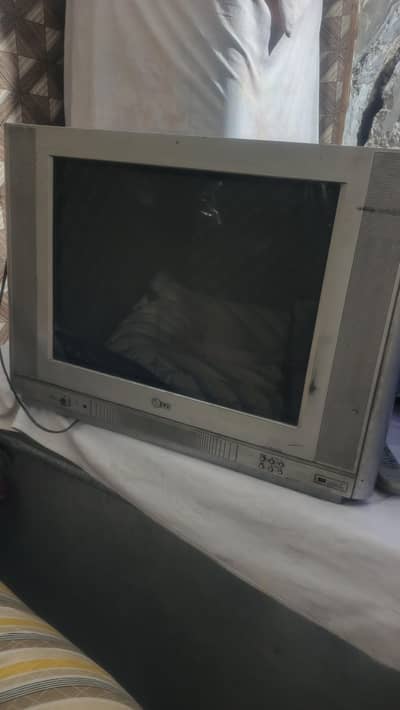 LG TV 24 inch for sale slight green shade
