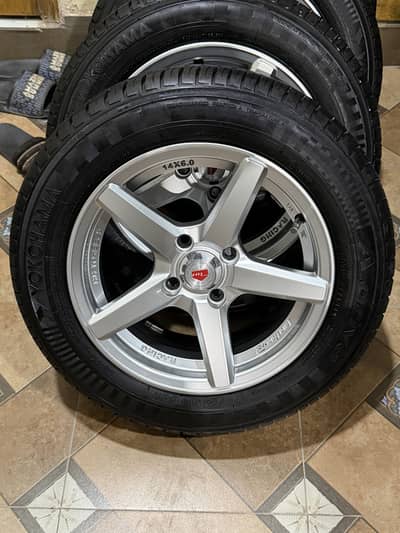4 Alloy wheels with Yokohama tyres 14 inches