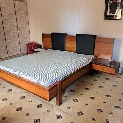 king Size bed with side and dressing tables