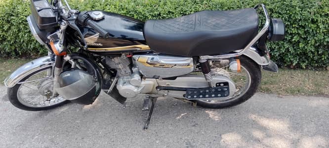 Honda 125 self start 5 garr wala ha 21 model ha good condition ma ha