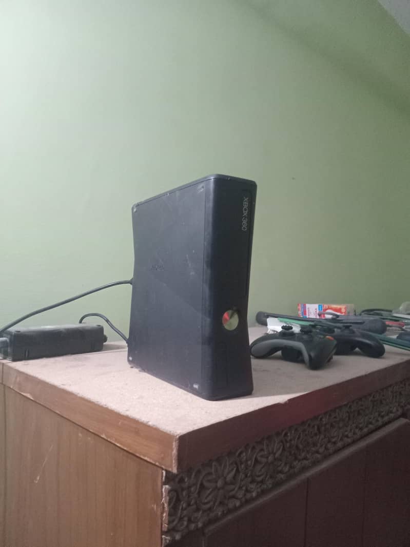 xbox 360 with two wireless controllers 1