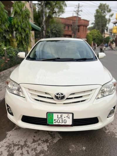 Toyota Corolla white Coler Very Good Condition Alloy Rims