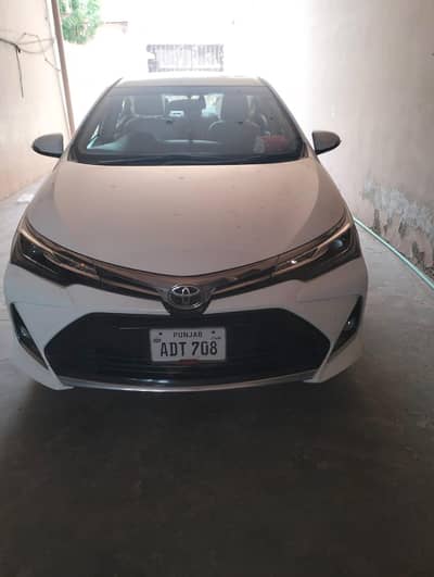 Toyota Altis Grande X  super white colour (21/7) model