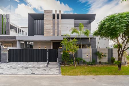 ONE KANAL BRAND NEW LUXURY ULTRA-MODERN DESIGN MOST BEAUTIFUL BUNGALOW FOR RENT AT HOT LOCATION OF DHA PHASE 6 C BLOCK 15KV SOLAR INSTALLED