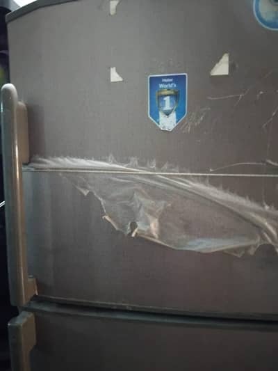 Used refrigerator for sale in fair condition.