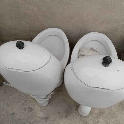 2 English toilet  seat's