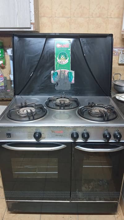 care cooking range with oven and hot case