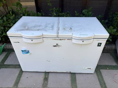 selling used dawlance inverter deep freezer in very reasonable price