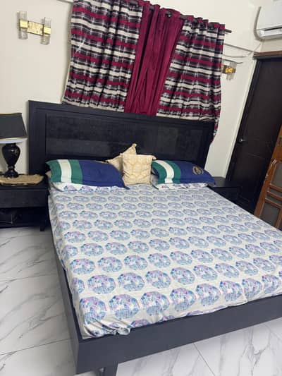 bed and side table and dressing