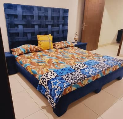 Bed with side tables