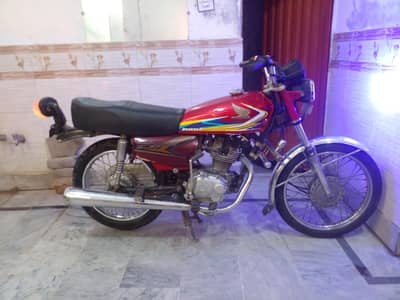 Honda 125  in original condition very good sound with biometric