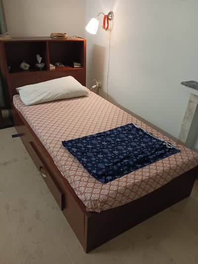 One week offer. Single beds with new mattress and side tables