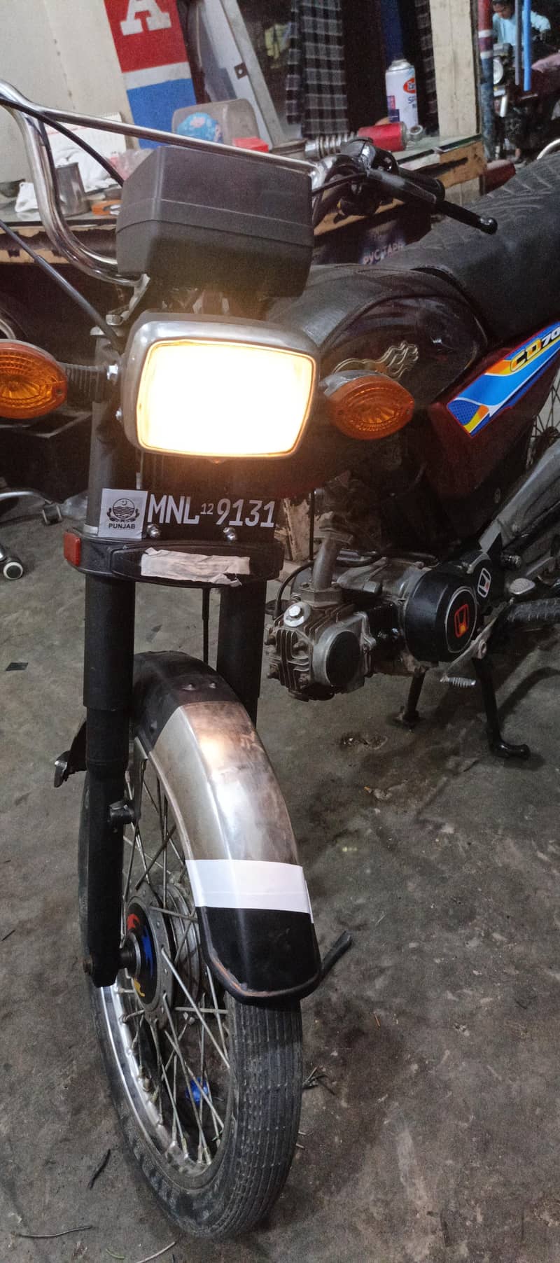 Dhoom 70cc 7