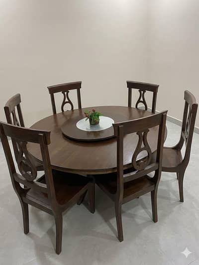 Round dining table with 6 chairs