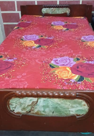 Single wooden bed for sale