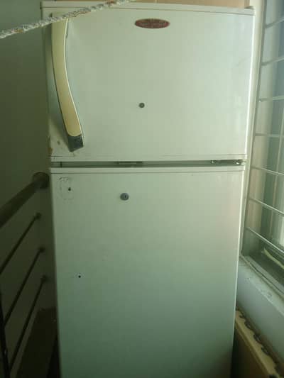selling working fridge .