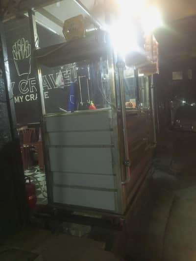 swarma burger counter  and freezer and chair