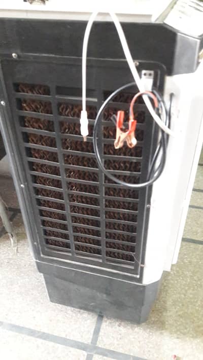 Ac Dc cooler wapda ,battery,soler 3 in one (kise pr b chla sktye hn