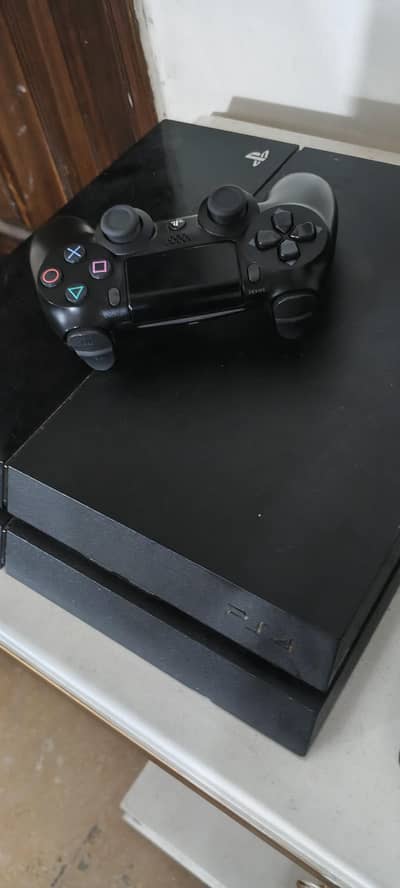 PS4 WITH 4 GAMES