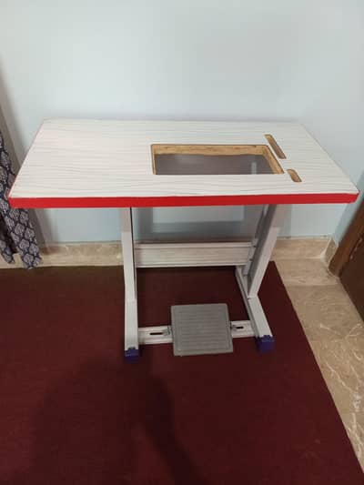 Sewing machine table