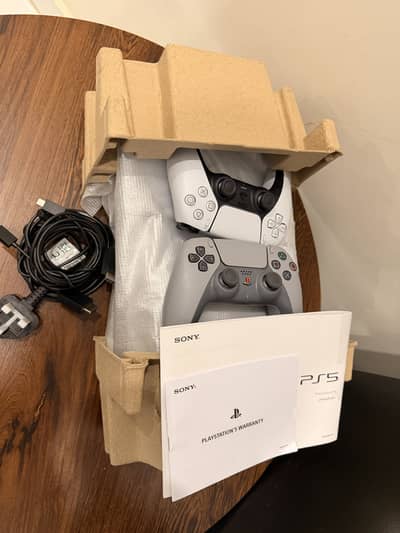 PlayStation 5 Slim Disc Edition with extra controller and headset