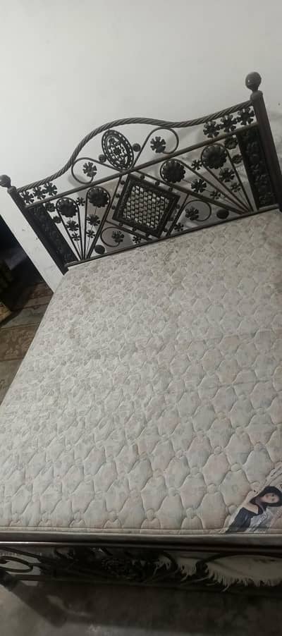 Iron bed with mattress