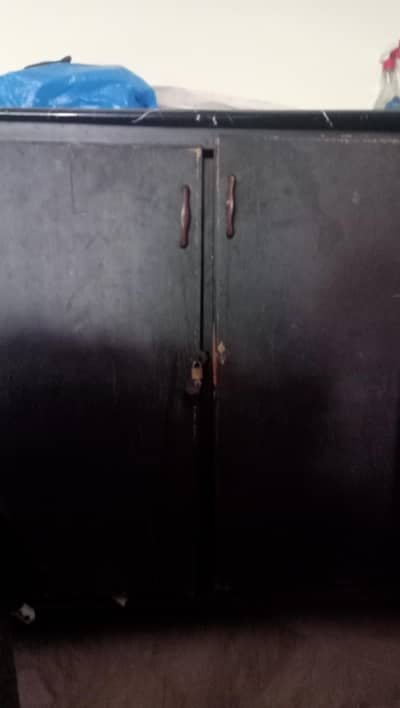 A pair of wardrobe and iron stand