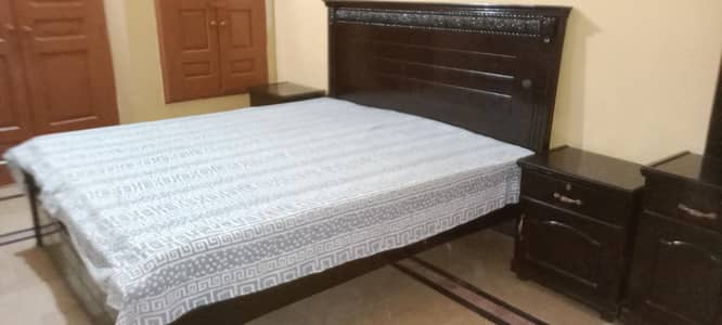 bed,side tables with dressing table